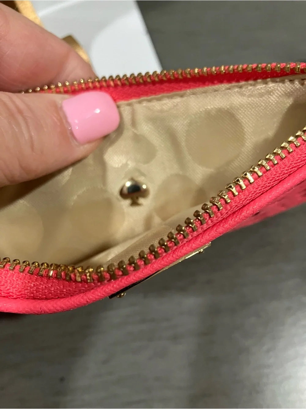 Kate Spade laser-cut floral wristlet clutch in pink
